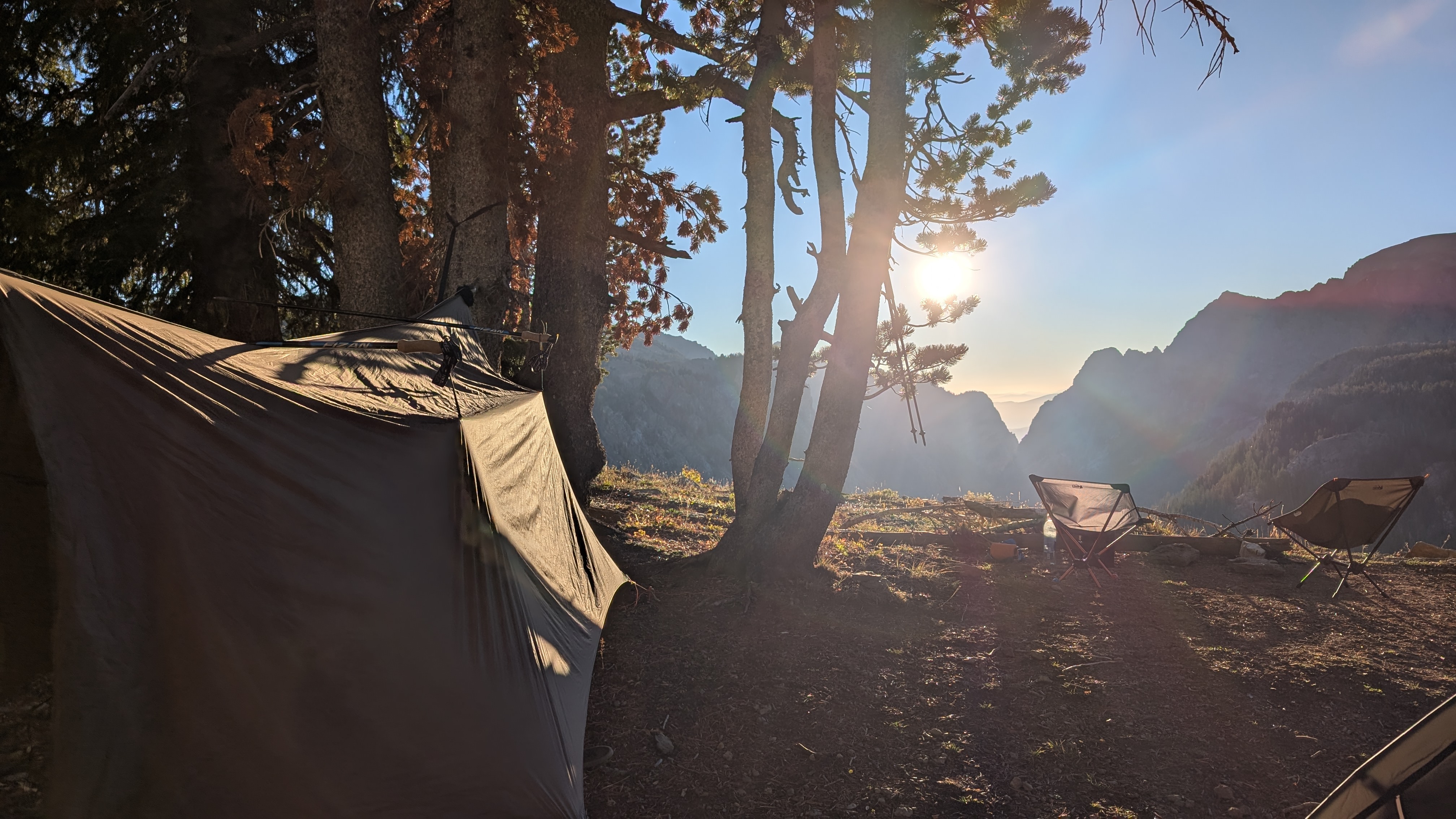 Down sleeping bag and pad inside a tent
